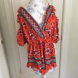 Orange patterned romper